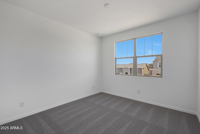 4106 W Eli Dr, San Tan Valley, AZ 85144 - empty room featuring baseboards and dark carpet