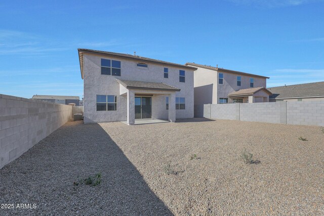 4106 W Eli Dr, San Tan Valley, AZ 85144 - back of property with a patio area, a fenced backyard, and stucco siding