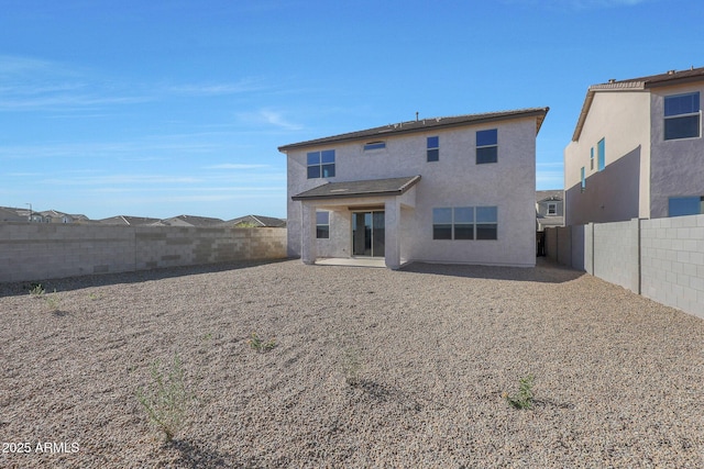 4106 W Eli Dr, San Tan Valley, AZ 85144 - rear view of property with stucco siding, a patio, and a fenced backyard