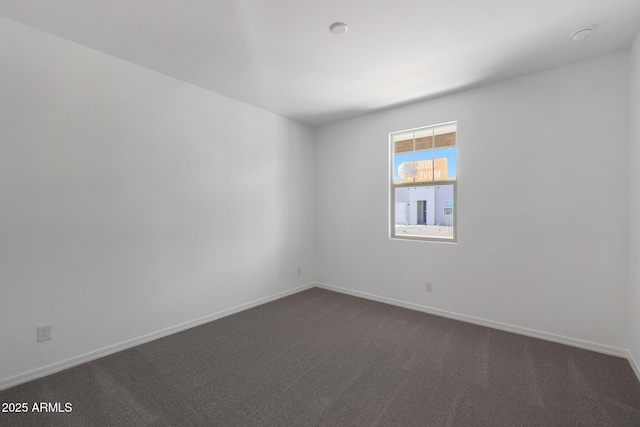 4106 W Eli Dr, San Tan Valley, AZ 85144 - unfurnished room with baseboards and dark carpet