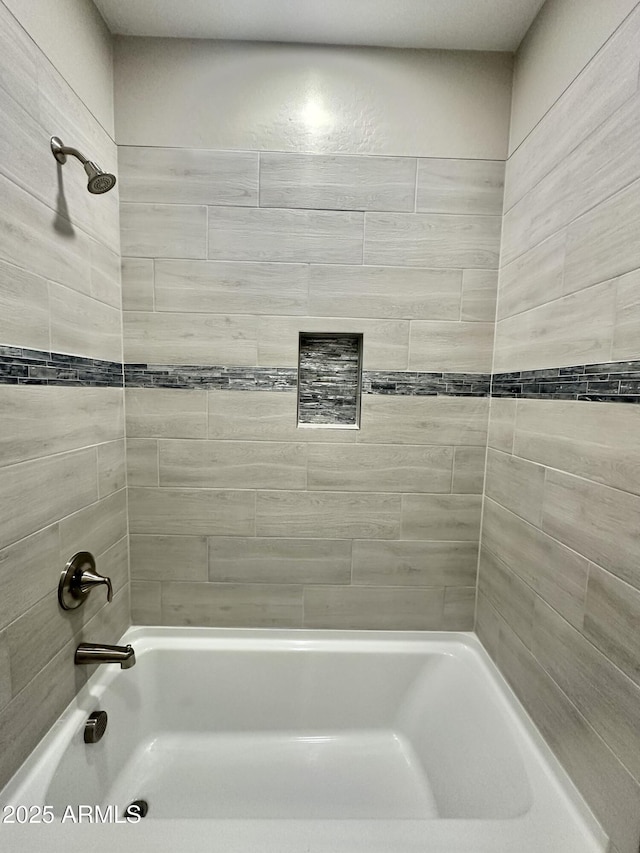 bathroom featuring shower / bathtub combination