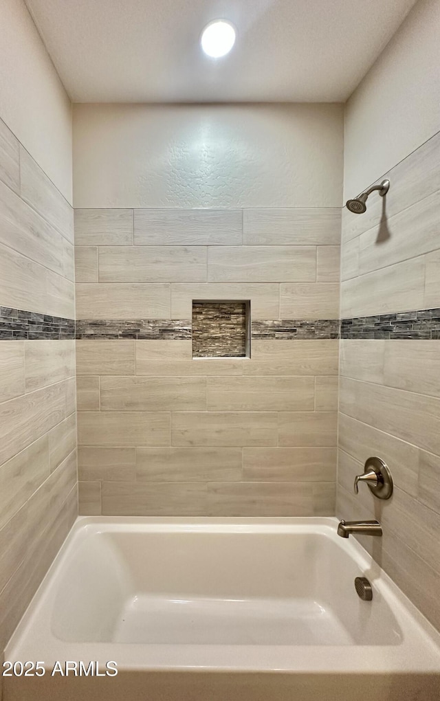 bathroom featuring shower / bathing tub combination