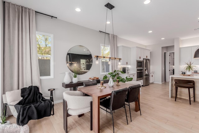 dining area featuring light hardwood / wood-style flooring