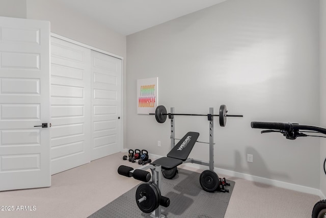 exercise area featuring carpet floors