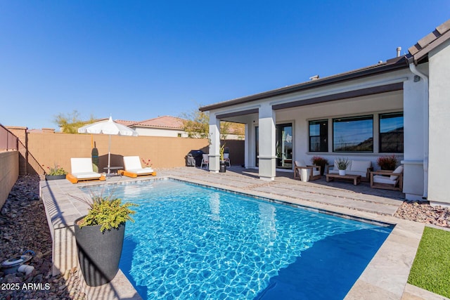 view of pool featuring a patio area