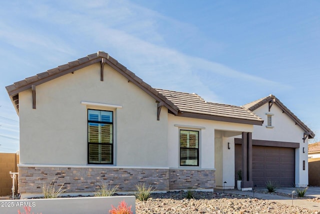 view of front of home with a garage