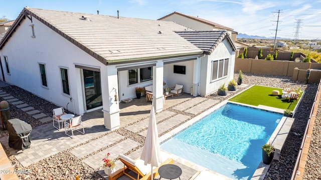 view of pool featuring a patio area