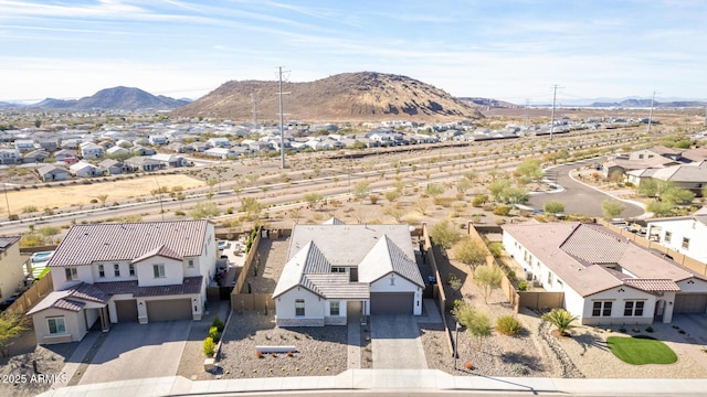 birds eye view of property featuring a mountain view