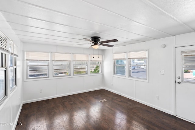 unfurnished sunroom featuring plenty of natural light and ceiling fan