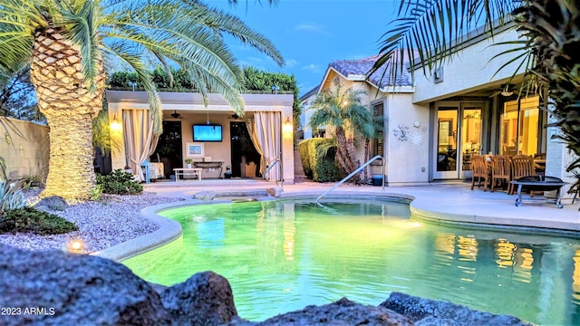 pool featuring a patio area