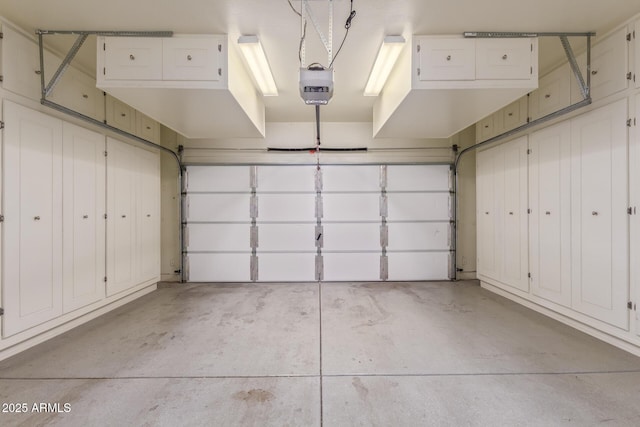 parking deck featuring a garage door opener