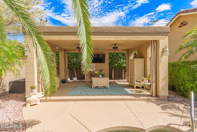 view of patio with ceiling fan