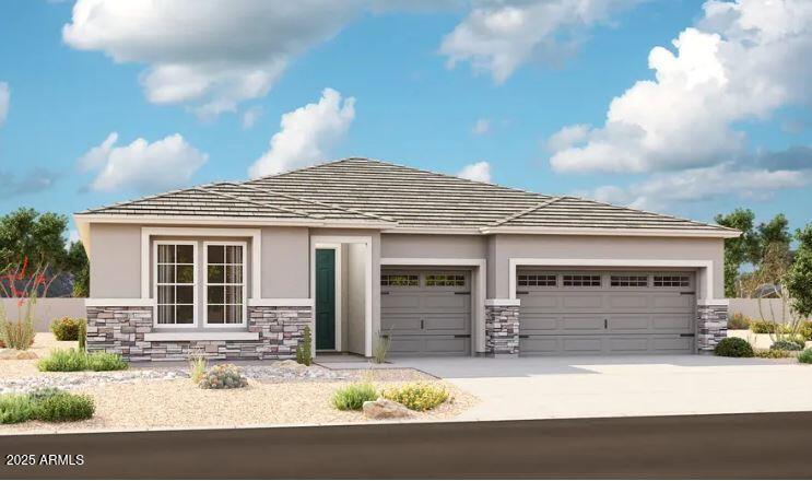 27611 N 176th Dr, Surprise, AZ 85387 - prairie-style home with stone siding, an attached garage, concrete driveway, and stucco siding