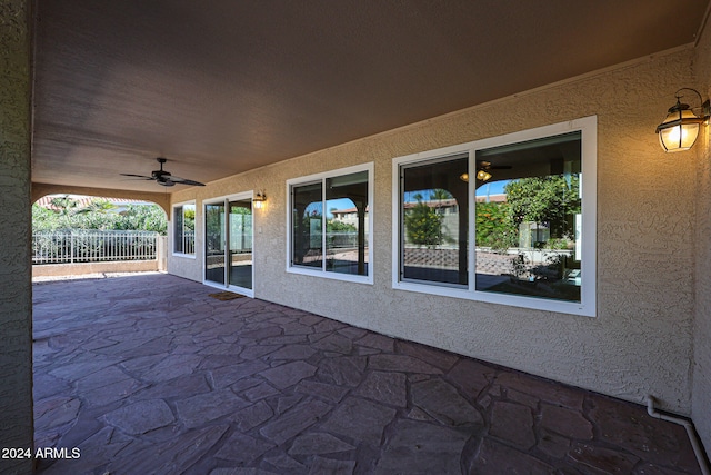 view of patio with ceiling fan