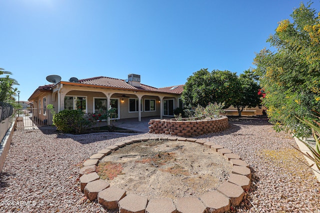 rear view of property with a patio