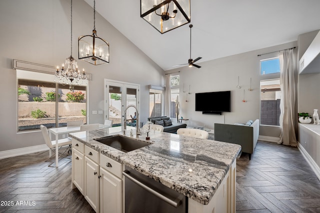 1834 W Nighthawk Way, Phoenix, AZ 85045 - kitchen with a sink, dishwasher, a chandelier, high vaulted ceiling, and baseboards