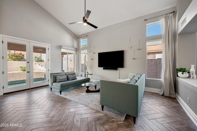 1834 W Nighthawk Way, Phoenix, AZ 85045 - living area featuring high vaulted ceiling, a ceiling fan, healthy amount of natural light, french doors, and baseboards