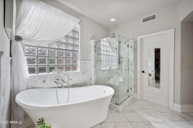 1834 W Nighthawk Way, Phoenix, AZ 85045 - bathroom with a shower stall, a soaking tub, marble finish flooring, and tile walls