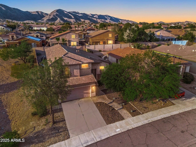 1834 W Nighthawk Way, Phoenix, AZ 85045 - aerial view at dusk of a residential view and a mountain view