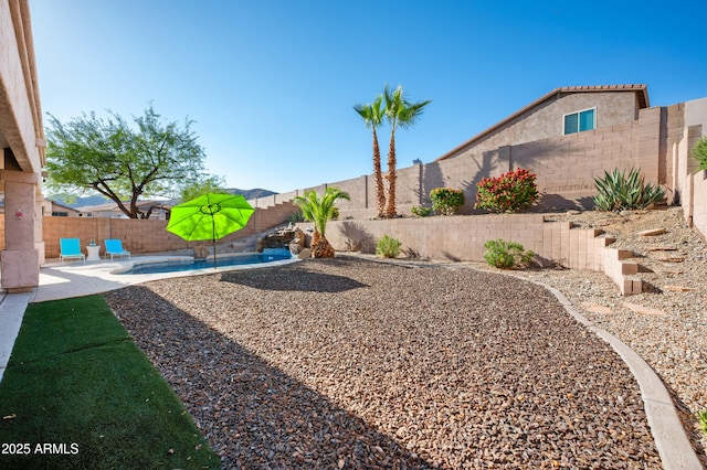 1834 W Nighthawk Way, Phoenix, AZ 85045 - fenced backyard with a patio area