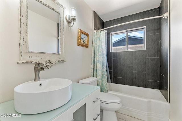 full bath with toilet, shower / bathtub combination with curtain, and vanity