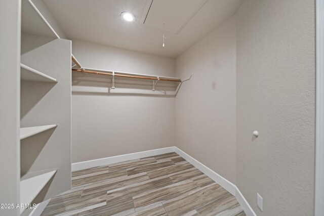 2105 W Terrace Dr, Wickenburg, AZ 85390 - spacious closet with attic access and wood finished floors