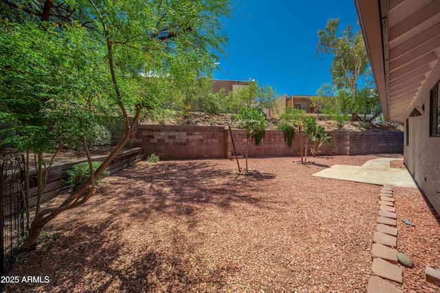 2105 W Terrace Dr, Wickenburg, AZ 85390 - view of yard featuring a patio and a fenced backyard