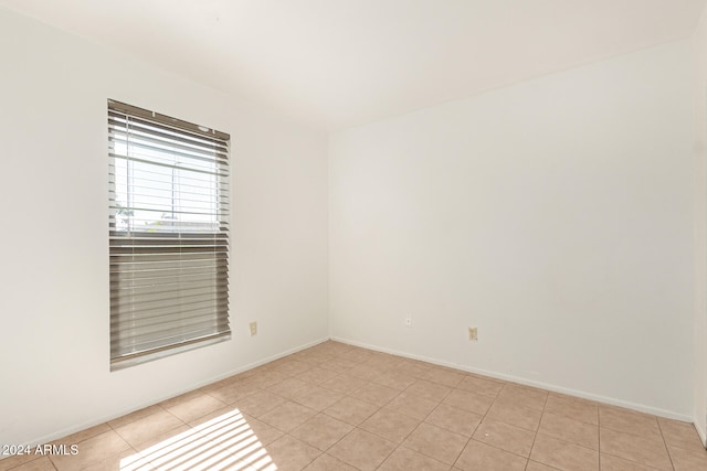 view of tiled spare room