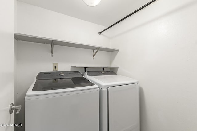 laundry room featuring washer and clothes dryer