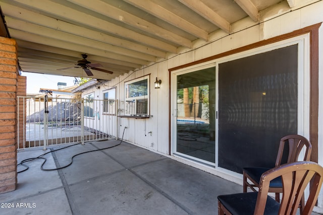 view of patio featuring ceiling fan