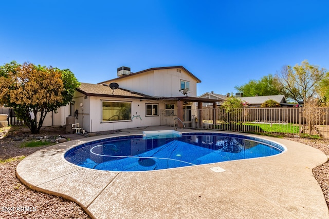 view of pool featuring a patio