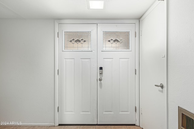 view of tiled entrance foyer