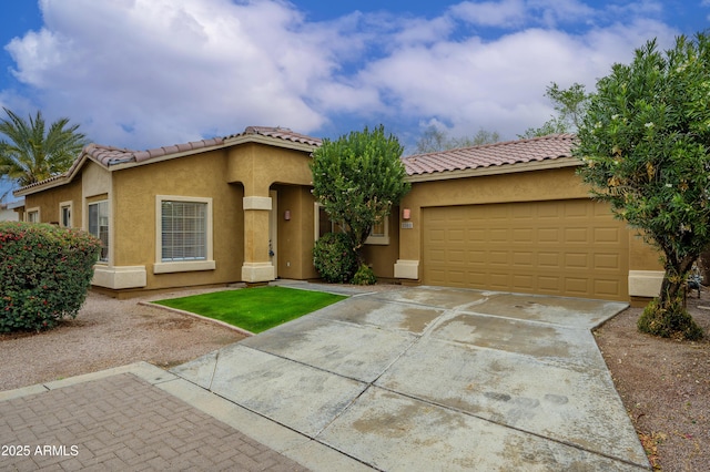 mediterranean / spanish-style home featuring a garage, driveway, a tile roof, and stucco siding