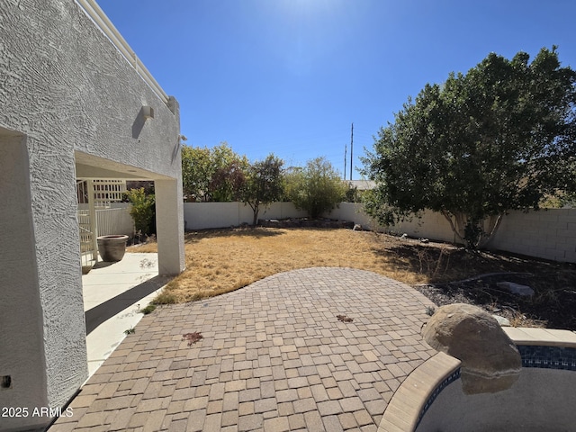 view of patio with a fenced backyard