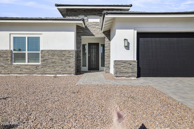 property entrance featuring a garage