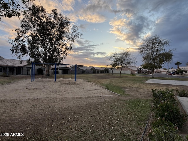 view of community with a residential view and a lawn