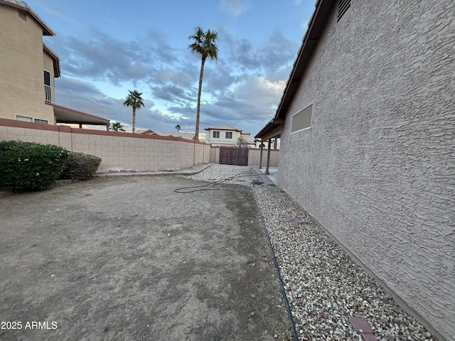 view of yard featuring a patio area and a fenced backyard