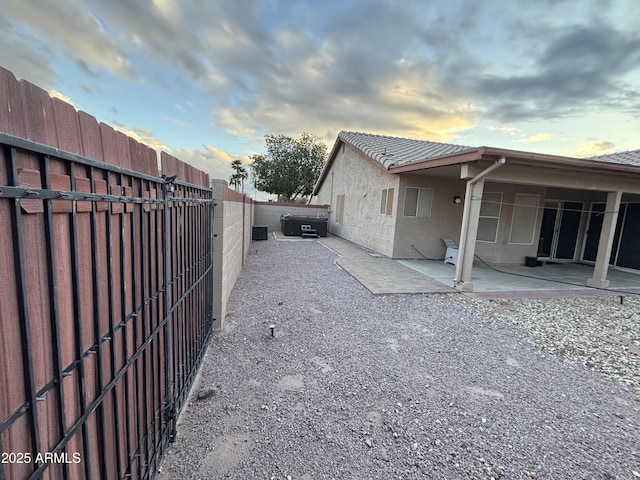 view of yard featuring a patio and fence