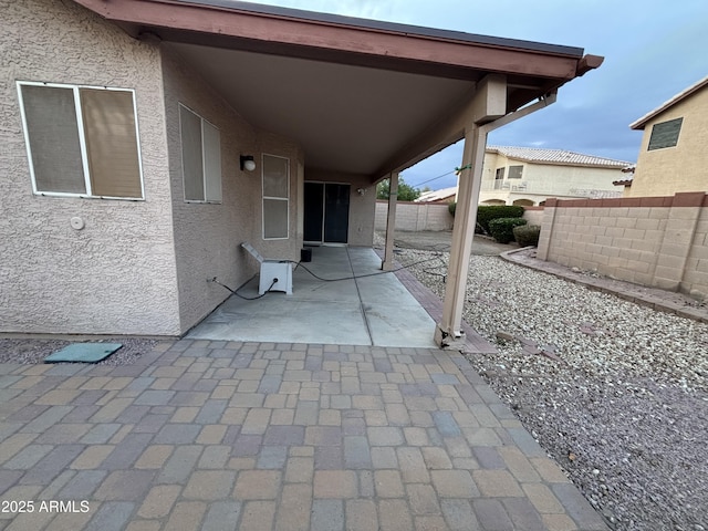 view of patio / terrace with fence