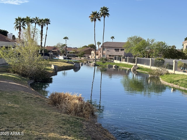 water view featuring fence