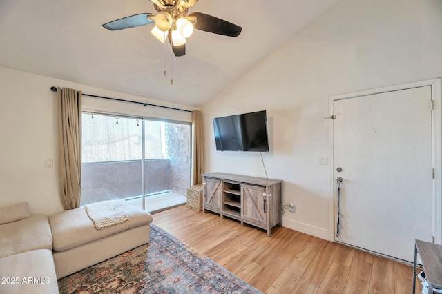 623 W Guadalupe Rd Unit 213, Mesa, AZ 85210 - living room with lofted ceiling, a ceiling fan, and light wood-style floors