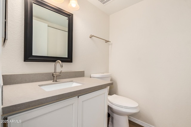 222 W Brown Rd Unit 14, Mesa, AZ 85201 - bathroom featuring toilet and vanity