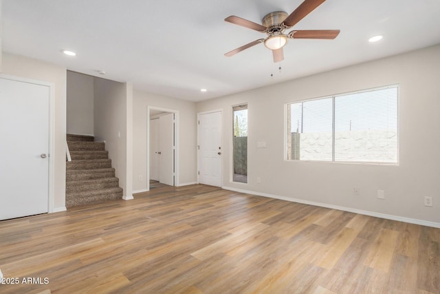 222 W Brown Rd Unit 14, Mesa, AZ 85201 - unfurnished living room with stairs, recessed lighting, light wood-style flooring, and ceiling fan