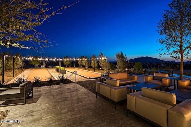 view of patio / terrace with a mountain view