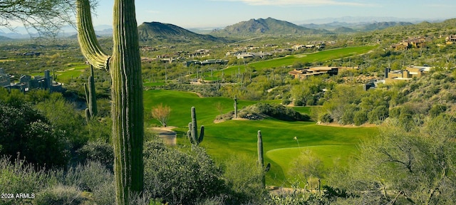 surrounding community with a mountain view