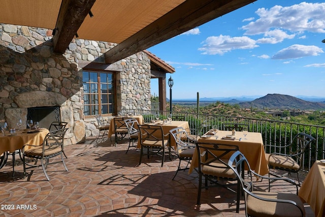 view of patio with a mountain view