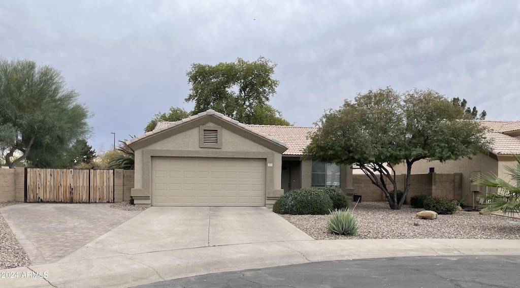 single story home with a garage