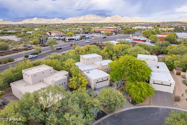 drone / aerial view with a residential view and a mountain view