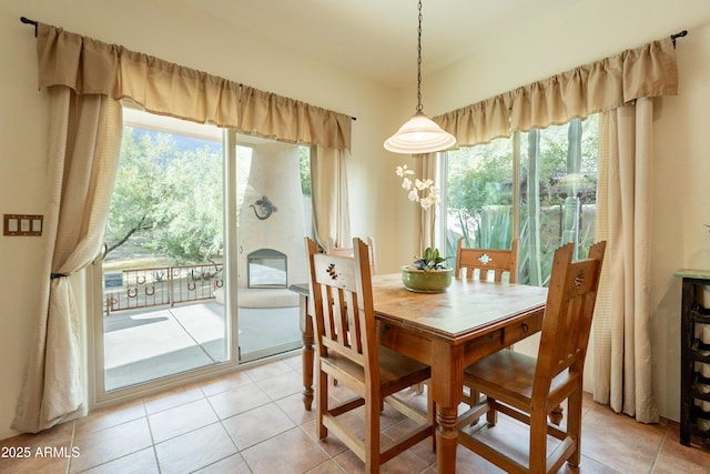 dining area with light tile patterned floors
