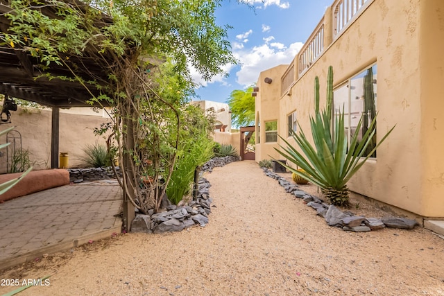 view of yard featuring a patio and a fenced backyard